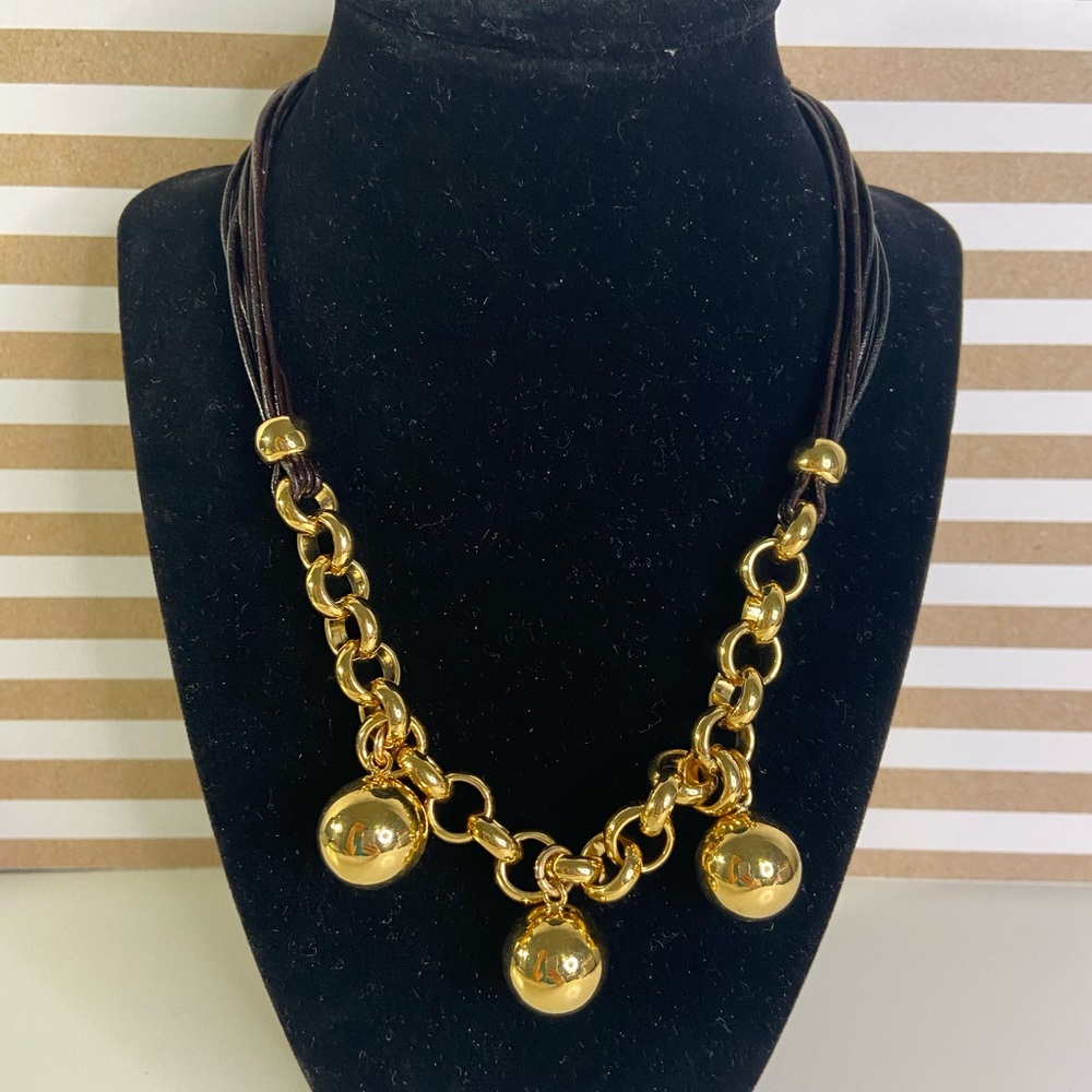 Leather necklace with three gold color balls